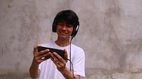 Asian man is using smartphone 写真素材