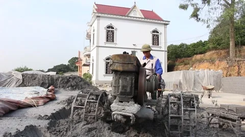 Asian man using soil compacto Stock Footage 49699452