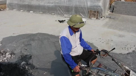 Asian man using soil compacto Stock Footage 49699474