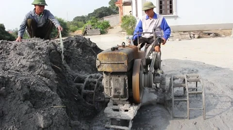Asian man using soil compacto Stock Footage 49699482