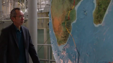 An Asian Man Viewing Globe in Museum Stock Footage 36134958