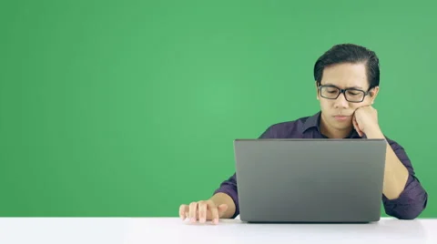 Asian Man Waiting Loading Process To Complete - Green Screen 4K Resolution Stock Footage 60610646