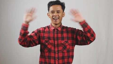 Asian man waving hand Stock Footage 319923686