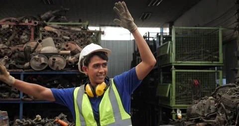 Asian man worker wears uniforms engineering greeting colleagues gives a hand Stock-Footage 173385951