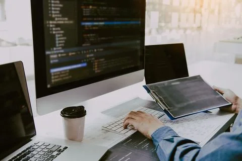 Asian man working code program developer computer web development working d.. 库存照片