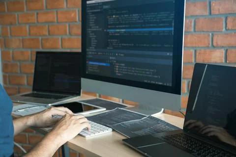 Asian man working code program developer computer web development working d.. Фото