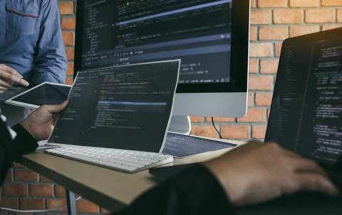 Asian man working code program developer computer web development working d.. Фото