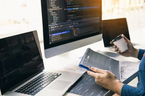 Asian man working code program developer computer web development working d.. Фото