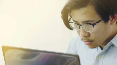 Asian Man Working on Laptop Close Up - 4K Resolution Stock Footage 60616742