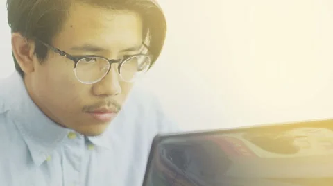 Asian Man Working on Laptop Close Up - Slow Motion Stock Footage 60616868