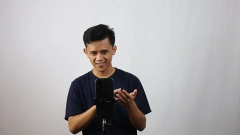 Asian man working live streaming selling digital products Stock Footage 314935672