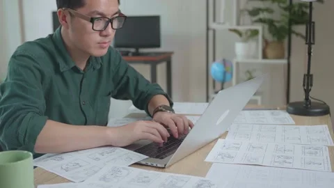 Asian Man Works With Laptop Computer And Storyboard. Video Editing, Comics Vídeos de archivo 160447955