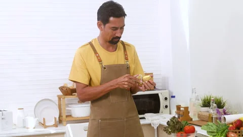Asian middle-aged freelancer with mustache and beard, influencer, Indian bl.. Stock Footage 254709368