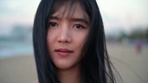 Asian model slow motion on beach during covid Stockbeeldmateriaal 168049361