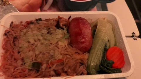 Asian multi-course gourmet meals food served in-flight on China Airlines Stock Footage 336270209