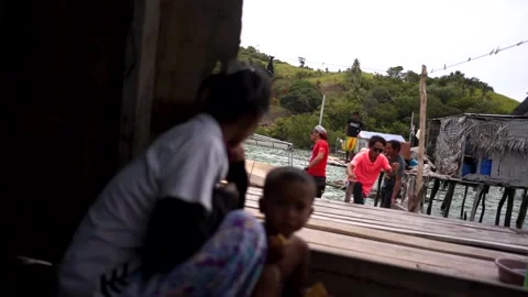 Asian Native Gypsies looking at camera and thinking at Sabah Malaysia Sempor Stock-Footage 136535284