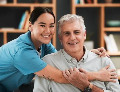Asian nurse, senior man and hug in portrait with support, empathy and nursing Stock Photos