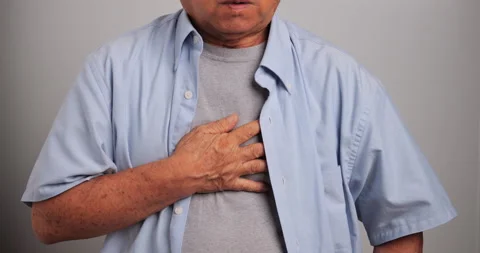 Asian old man has difficulty breathing. An elderly man has dyspnea Stock Footage 257848206