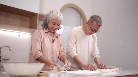Asian older couple joyful baking dough creating homemade bread pastry toget.. Stock Footage 333522239
