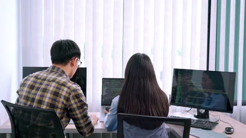 Asian Outsource Software engineer Developer Team Working Code to find solution Stock Footage 144189523