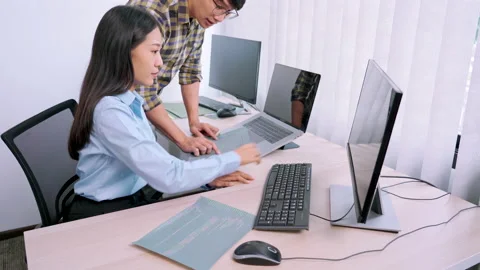 Asian Outsource Software engineer Developer Team Working Code to find solution Video stock 144189567
