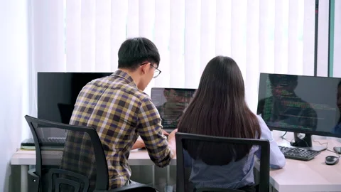 Asian Outsource Software engineer Developer Team Working Code to find solution Video stock 144189637