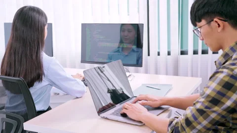 Asian Outsource Software engineer Developer Team Working Code to find solution Video stock 144190105