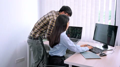 Asian Outsource Software engineer Developer Team Working Code to find solution Video stock 144190282