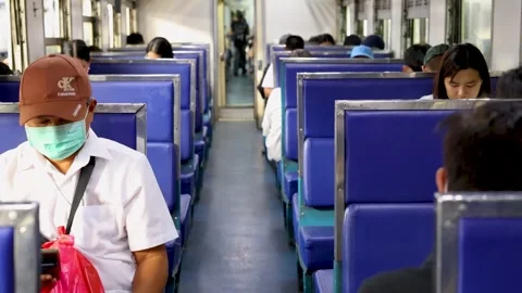 Asian Passengers Commuting on a Crowded Train in Bangkok Thailand Video stock 327629188