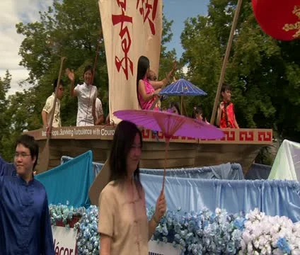 Asian people on Parade float Stock Footage 21668209