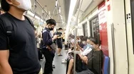 Asian People On Train Wearing Surgical Face Masks, Fear Of Coronavirus Stock Footage