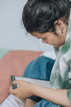 Asian plus-size freelancer working on her project, portraying the ease and Stock Photos