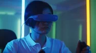 Asian Pro Gamer Puts On Vr Headset Playing Videogames With Joystick Stock Footage
