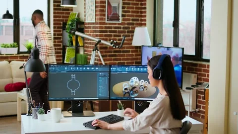Asian professional engineer works on coding industrial designs Stock Footage 319715189
