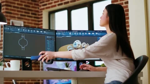 Asian professional engineer works on coding industrial designs Stock Footage 319721689
