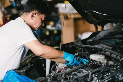 Asian professional worker using Wrench Block working fix replace service en.. 스톡 사진
