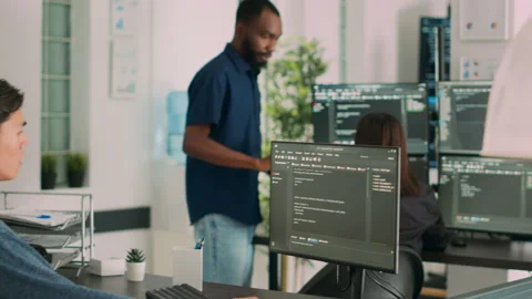 Asian programer developing database interface and writing server code Stock Footage 231450221