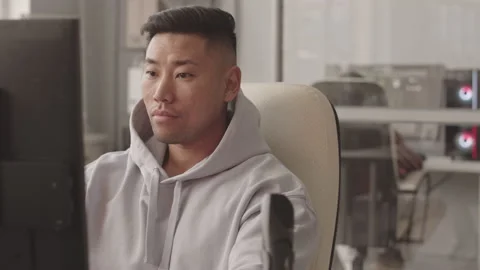 Asian Programmer Developing Computer Game Stock Footage 172191845