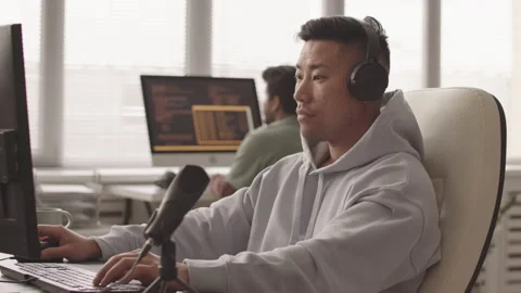 Asian Programmer Developing Video Game Stock Footage 172191544