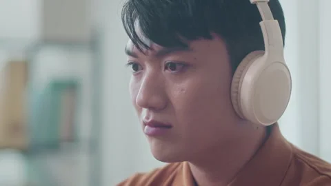 Asian Programmer Fixing Errors in Code on Laptop Stock Footage 265069173