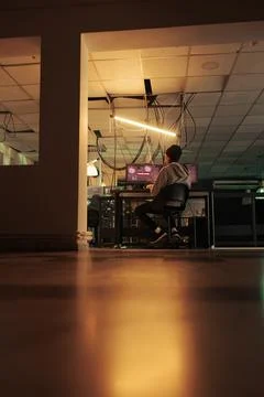 Asian programmer solving data leak problem, computer system hacking Stock Photos