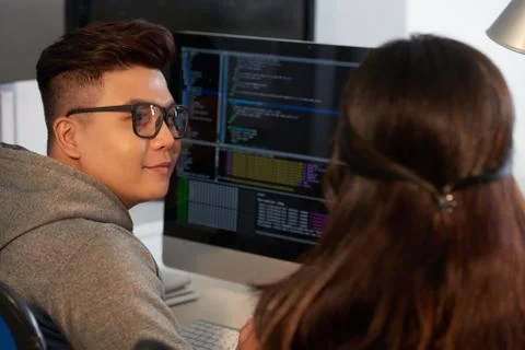 Asian Programmers Working Together Stock Photos