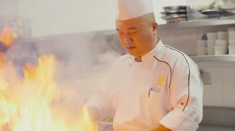 Asian restaurant kitchen, chinese chef cooking food, cook working Stock Footage