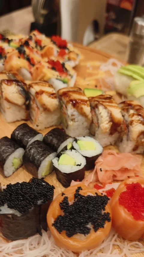 Asian restaurant, sushi on the table, close-up shot Stock Footage 269126187