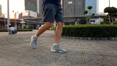 Asian runner city run during sunset Stock Footage 102939396