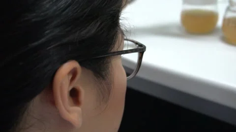 Asian scientist working in the lab Stock Footage 132892908