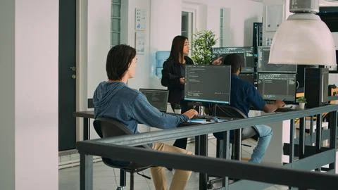 Asian script programer working with database information Stock Photos