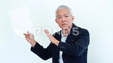 Asian senior businessman unhappy angry expression for report result Stock Photos
