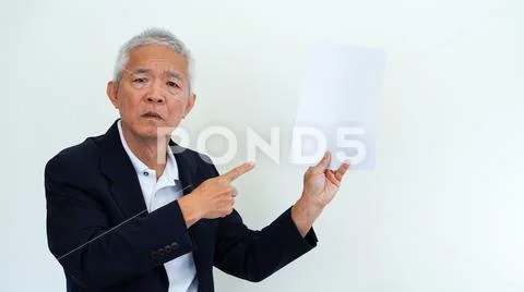 Asian senior businessman unhappy angry expression for report result Stock Photos