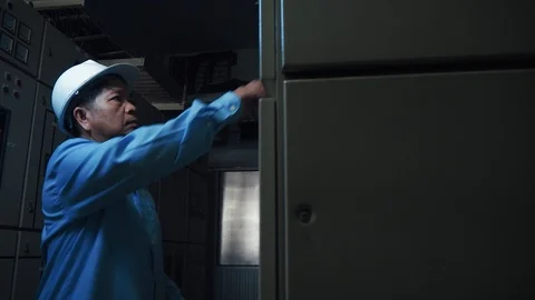 An asian senior computer engineer operating computer server Video stock 116751460